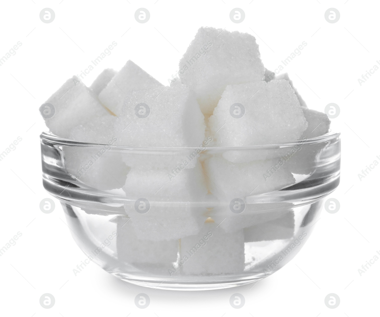 Photo of Refined sugar cubes in glass bowl isolated on white