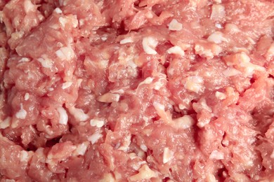 Photo of Raw chicken minced meat as background, top view