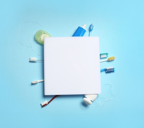 Flat lay composition with oral care items on color background. Space for text