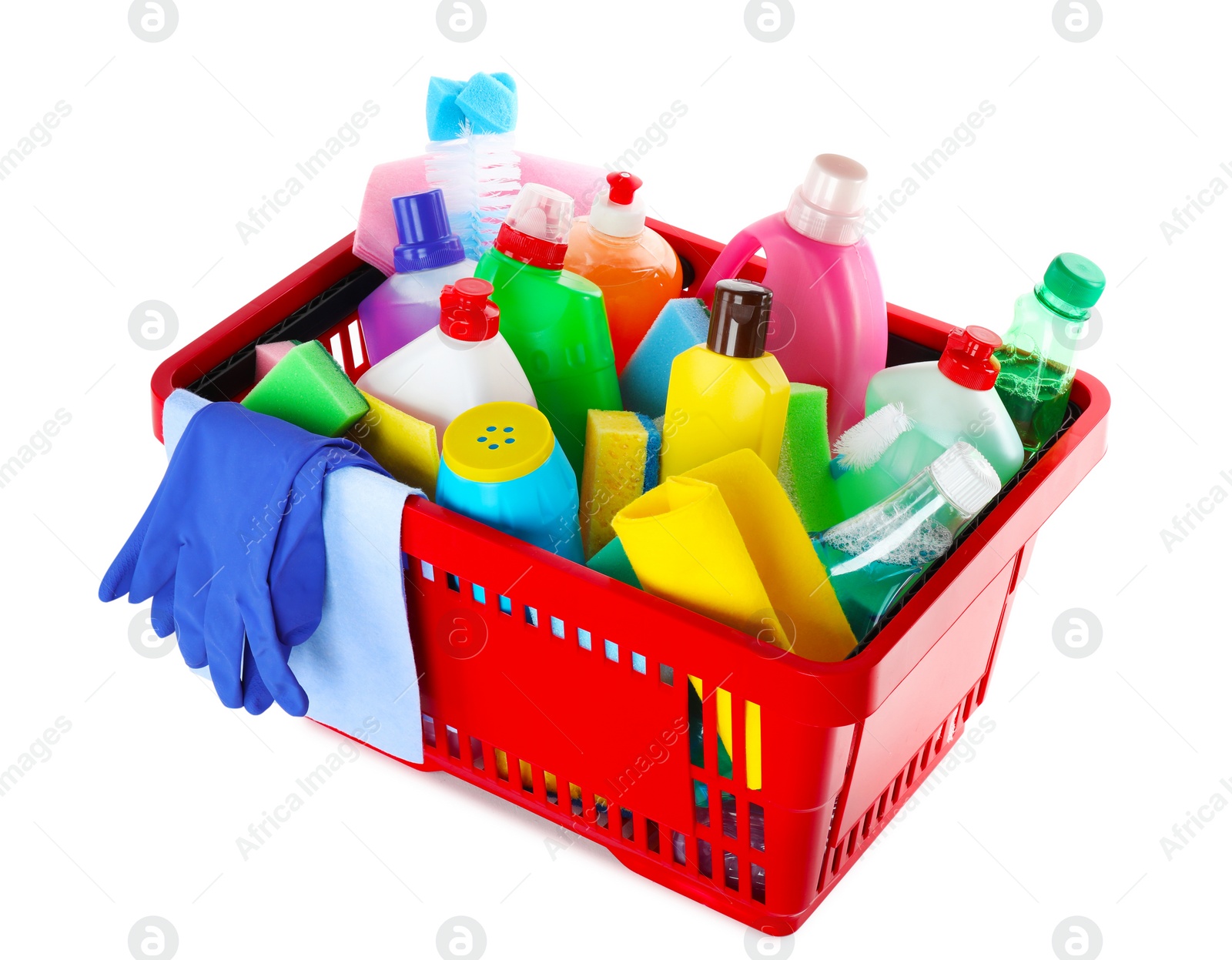 Photo of Shopping basket with different detergents, rag and gloves on white background