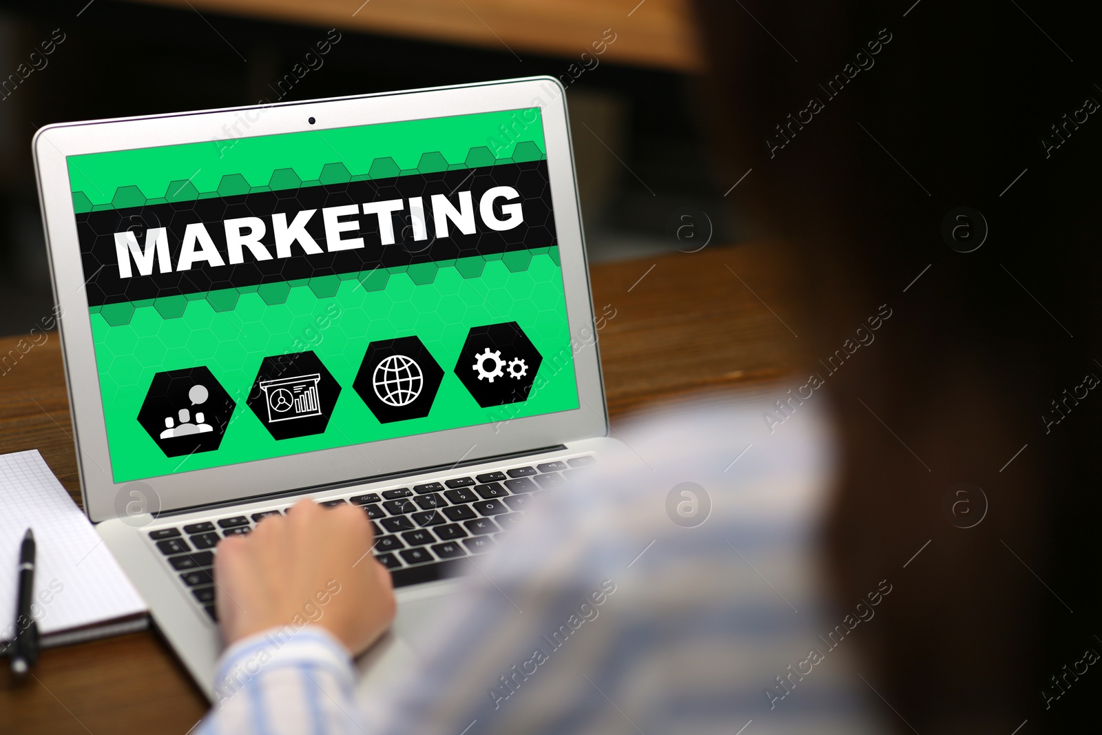 Image of Digital marketing concept. Woman working with laptop at table, closeup