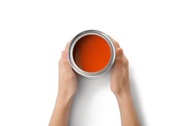 Photo of Woman with paint can on white background, top view