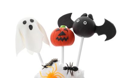 Photo of Delicious Halloween themed cake pops on white background