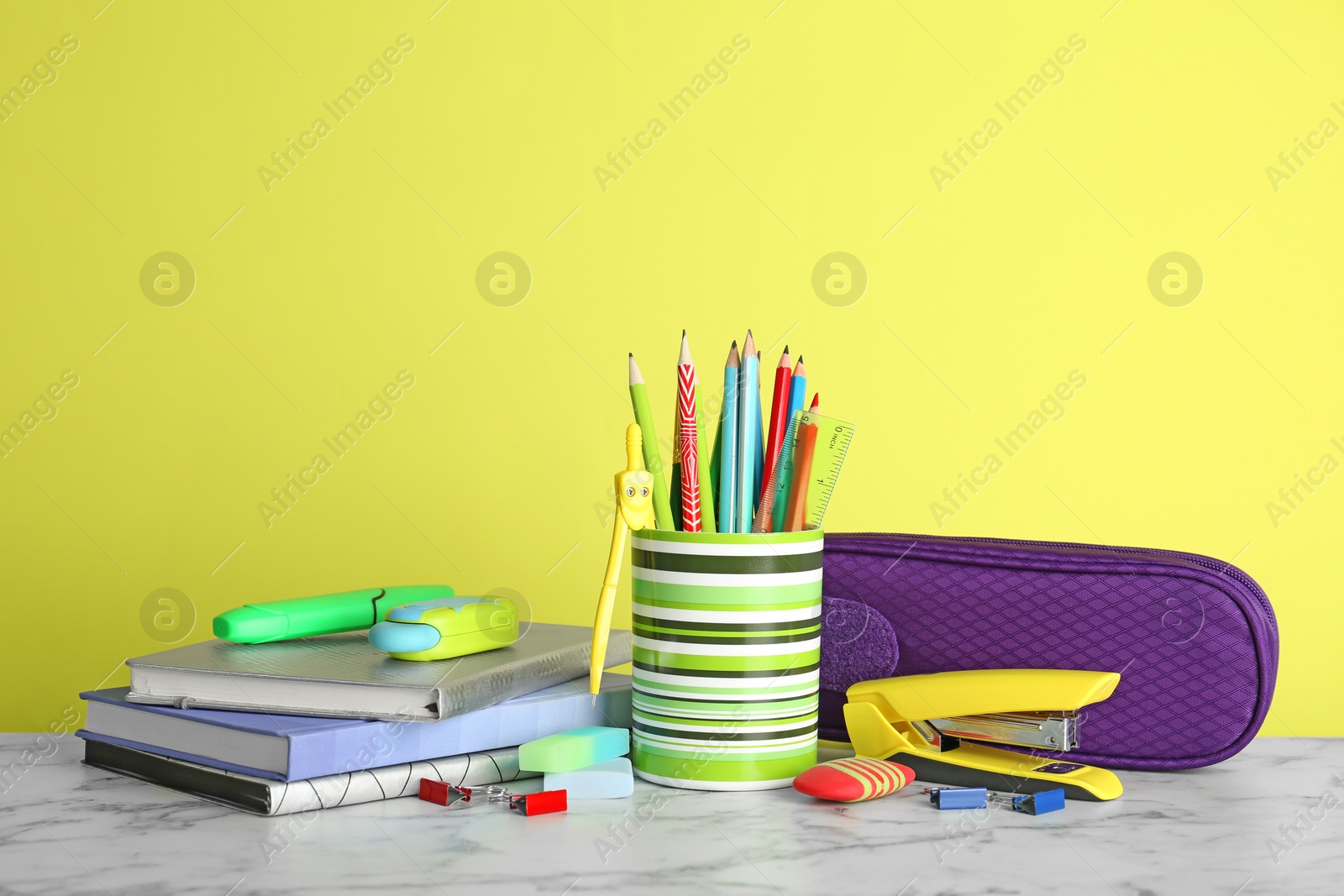 Photo of Different colorful stationery on table. Back to school