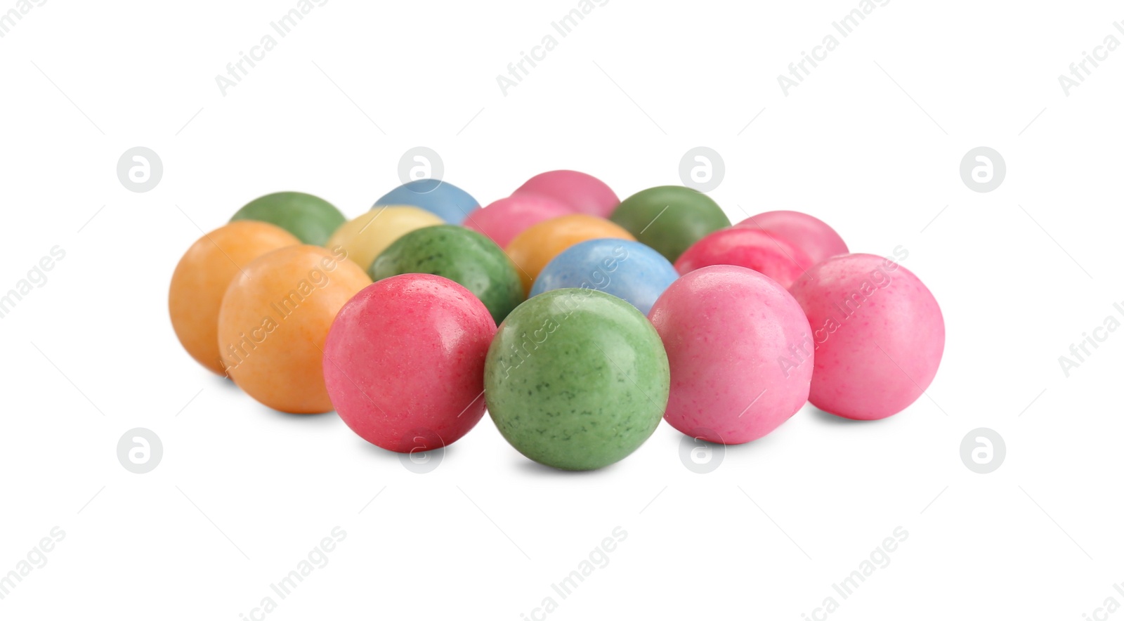 Photo of Many bright chewy gumballs isolated on white