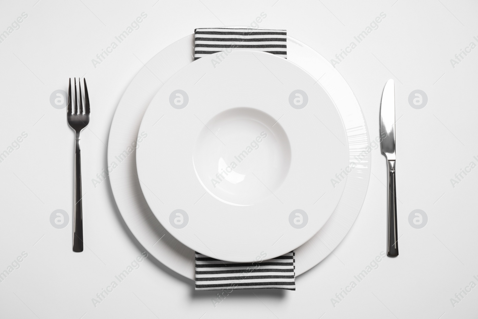 Photo of Stylish table setting on white background, top view