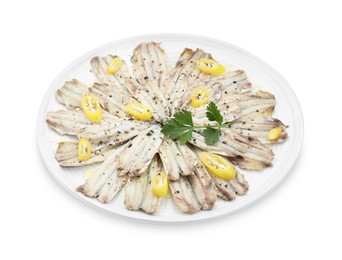 Photo of Tasty pickled anchovies with spices isolated on white