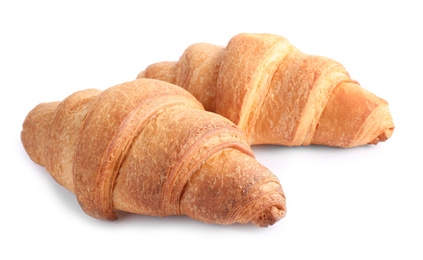 Photo of Tasty fresh crispy croissants isolated on white