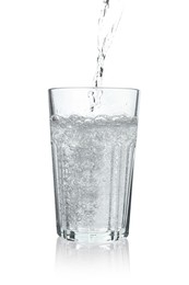 Photo of Pouring soda water into glass on white background