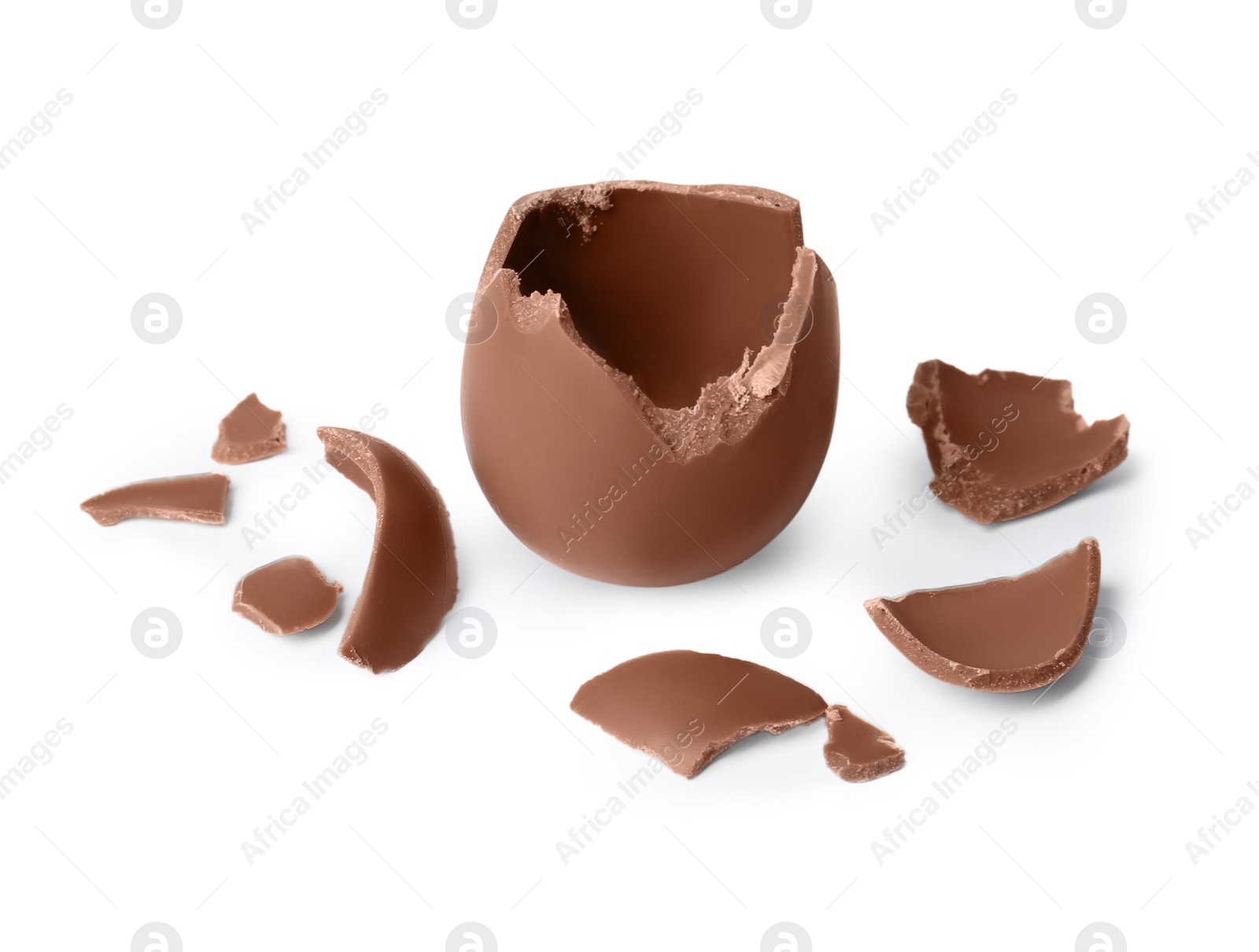 Photo of Tasty broken chocolate egg isolated on white