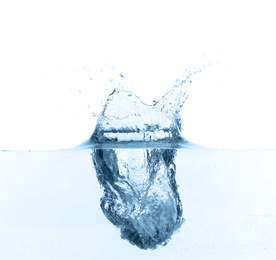 Photo of Splashclear water isolated on white, closeup