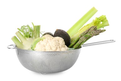 Photo of Metal colander with different vegetables and avocados isolated on white