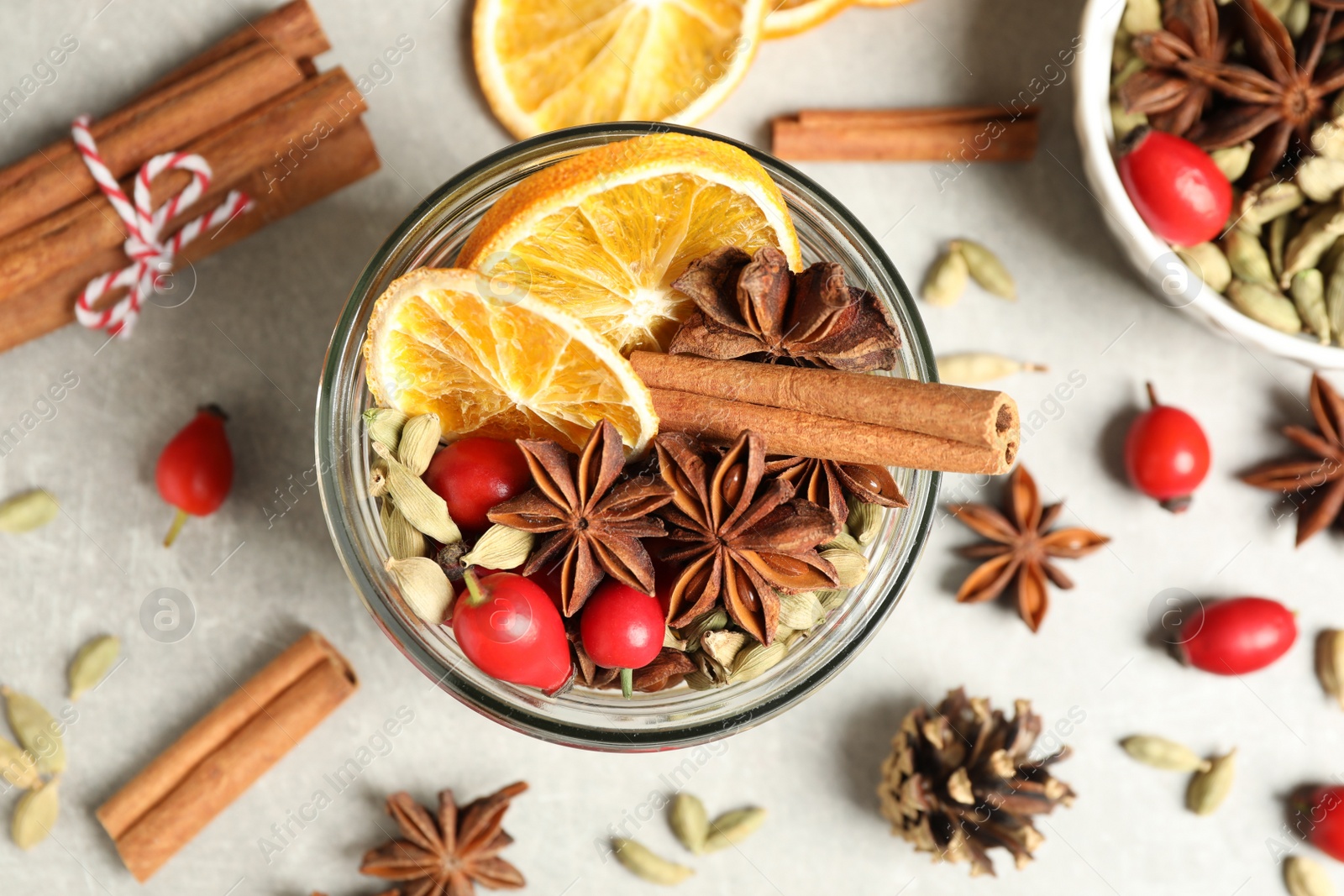 Photo of Aroma potpourri with different spices on white table, flat lay