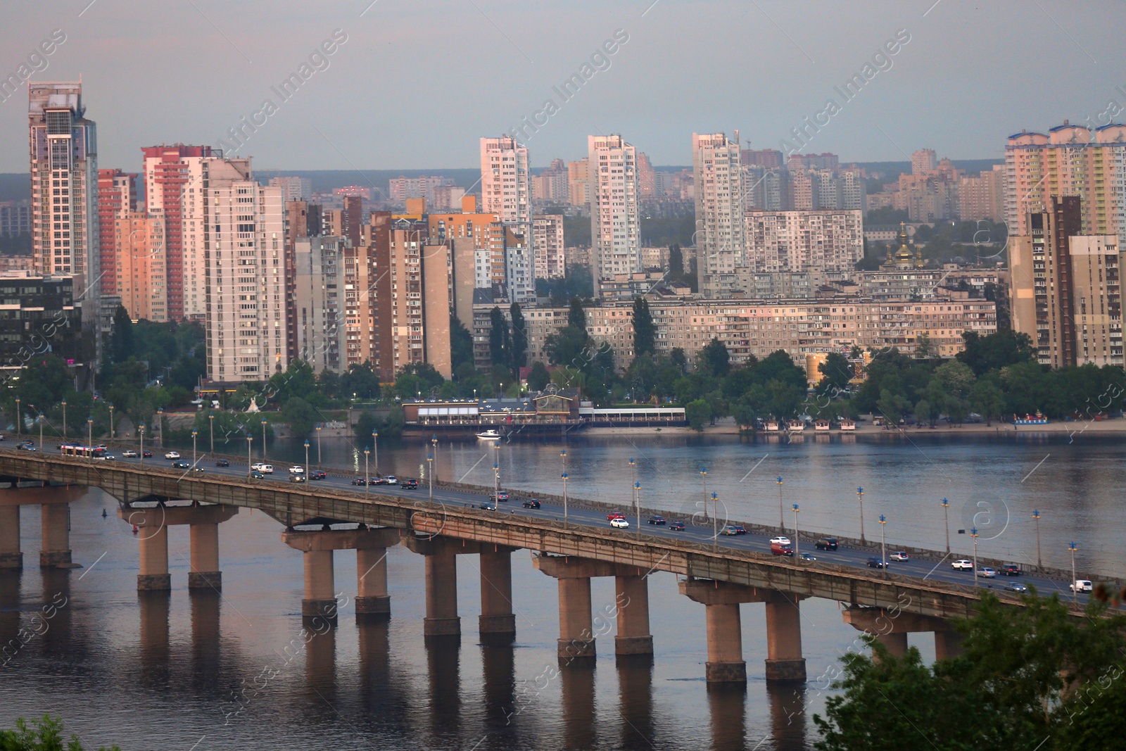 Photo of KYIV, UKRAINE - MAY 23, 2019: Beautiful view of Paton bridge over Dnipro river