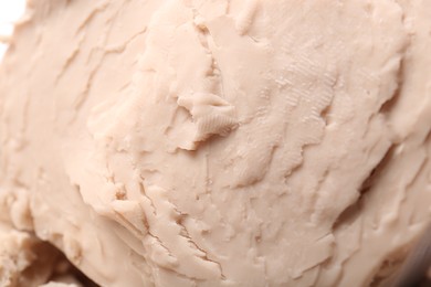 Texture of compressed yeast as background, closeup