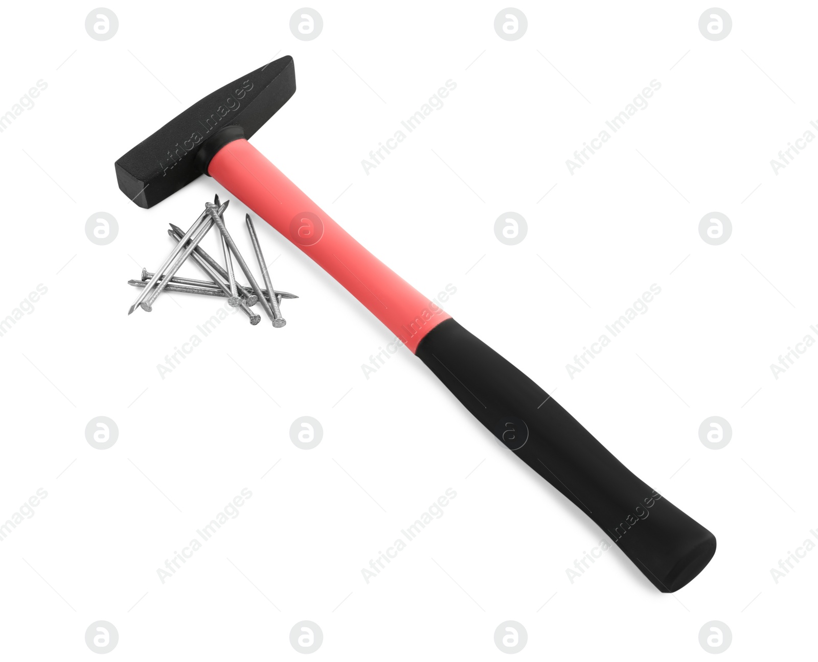 Photo of Hammer and metal nails on white background