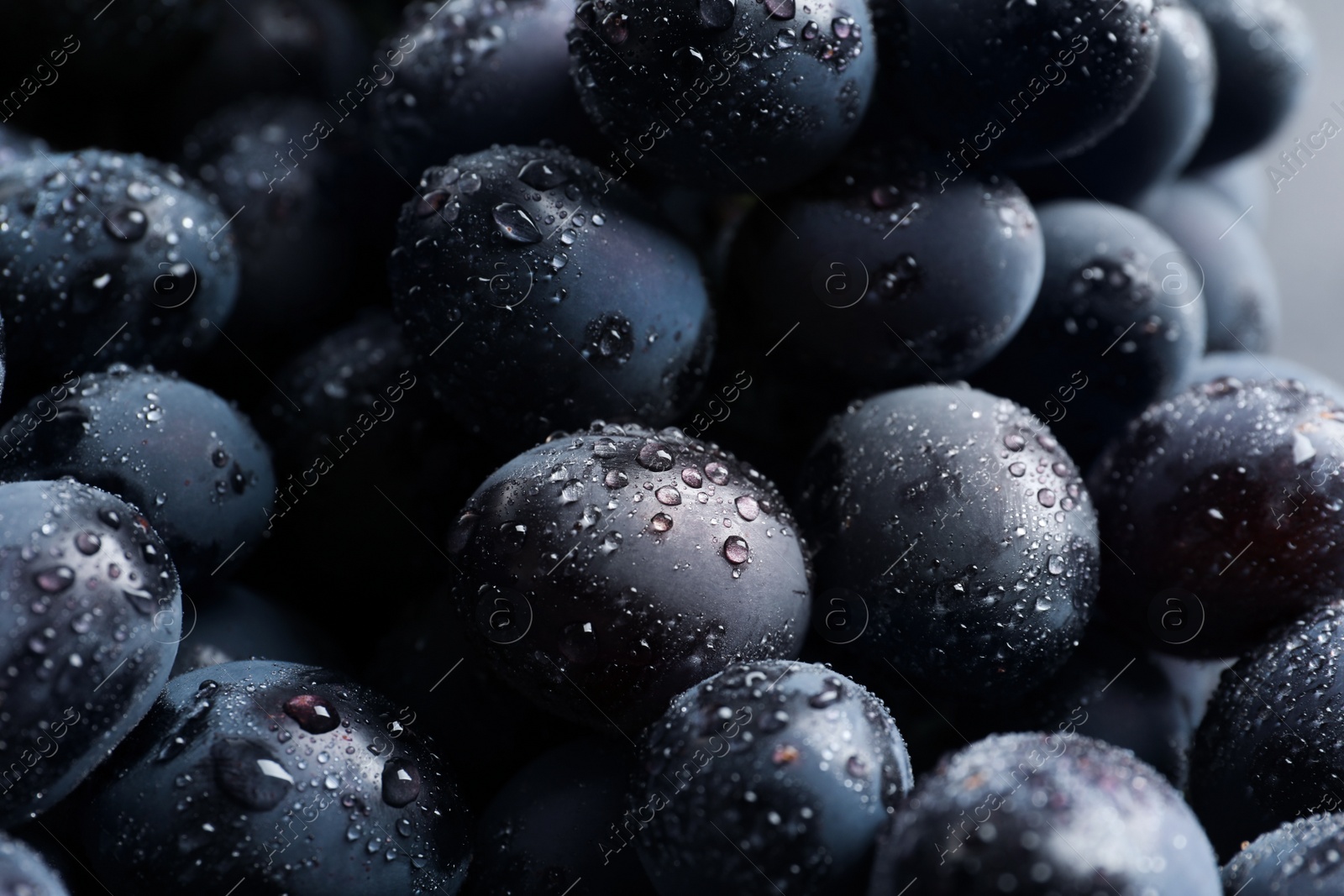 Photo of Bunch of fresh ripe juicy grapes as background. Closeup view