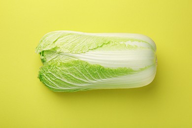 Photo of Fresh ripe Chinese cabbage on green background, top view