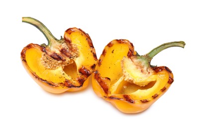 Halves of grilled yellow bell pepper isolated on white