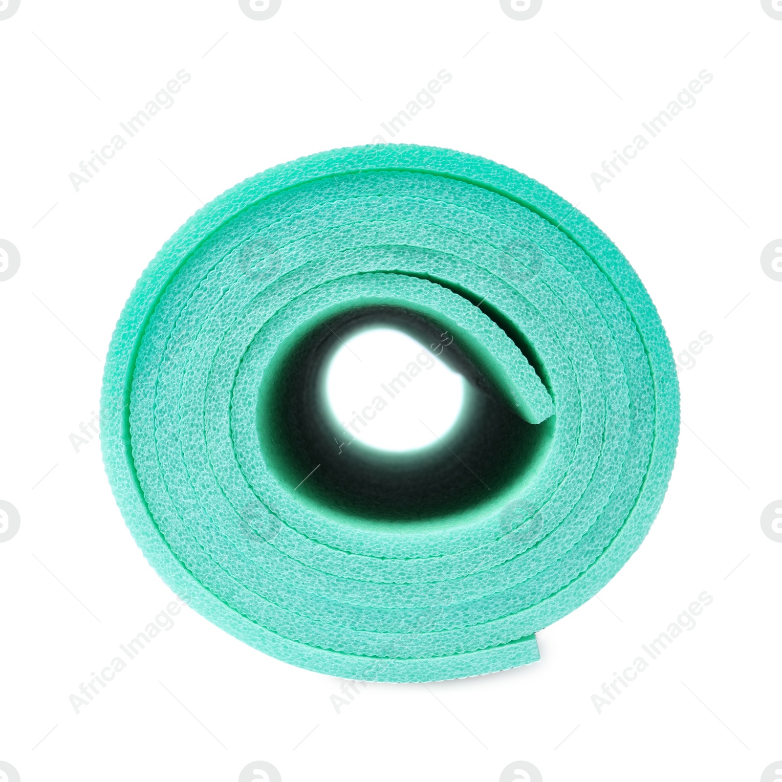 Photo of Rolled turquoise camping mat isolated on white