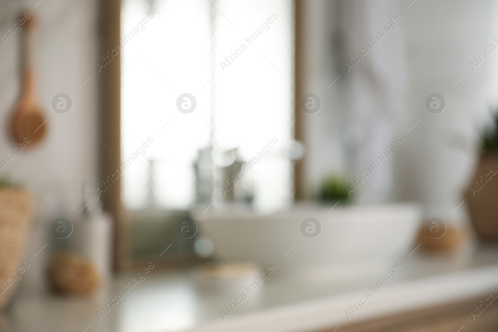 Photo of Blurred view of light modern bathroom interior