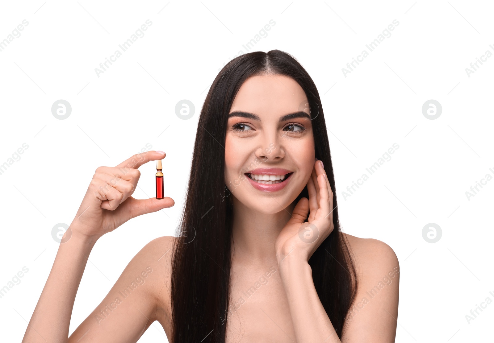 Photo of Beautiful young woman holding skincare ampoule on white background