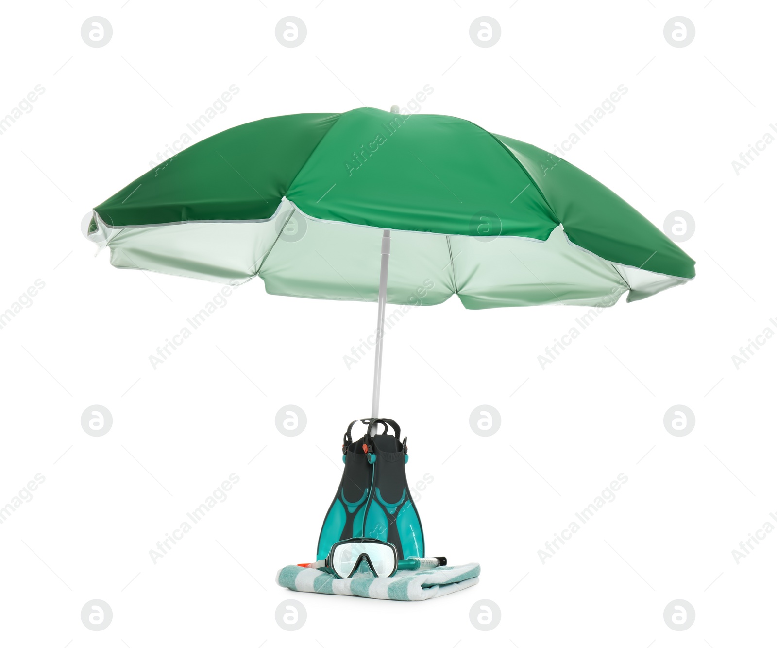 Photo of Open green beach umbrella, blanket and diving equipment on white background