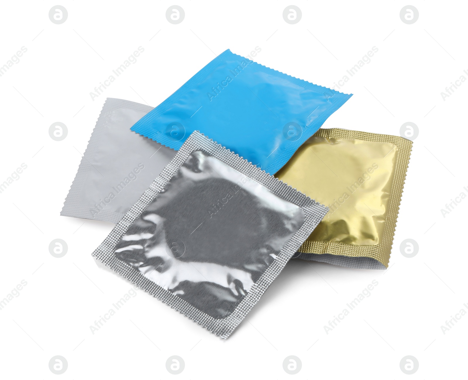 Photo of Condom packages isolated on white. Safe sex