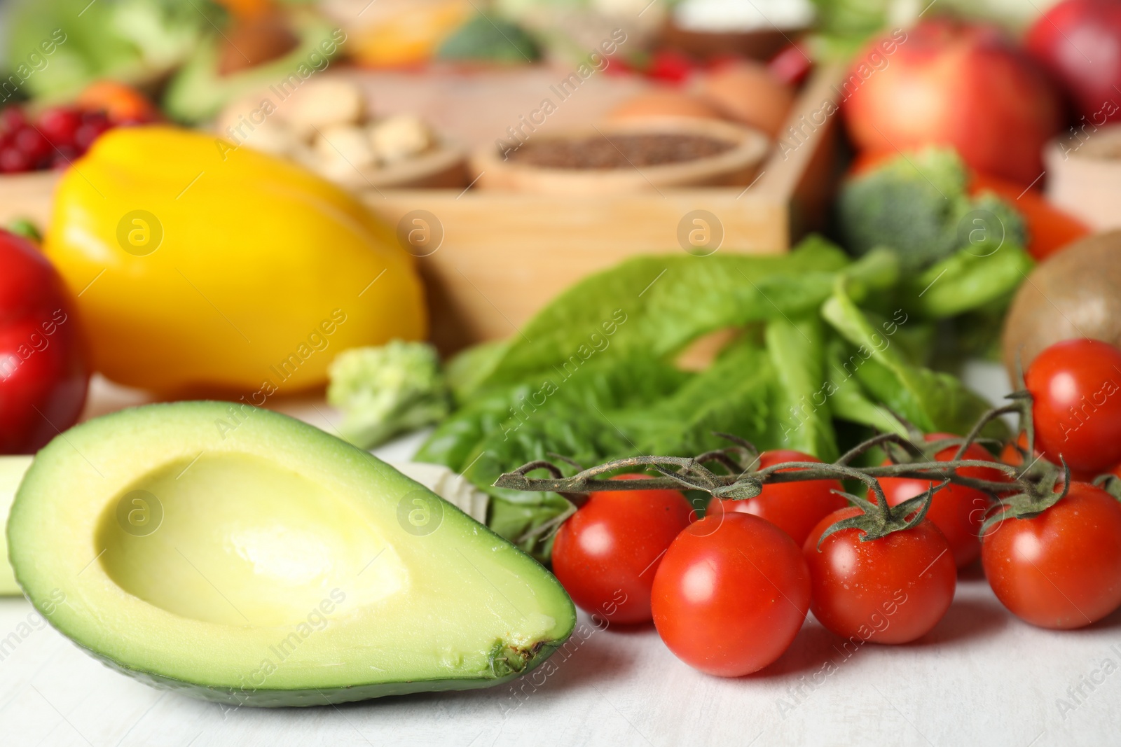 Photo of Many different healthy food on white table, closeup