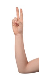 Photo of Playing rock, paper and scissors. Woman making scissors with her fingers on white background, closeup