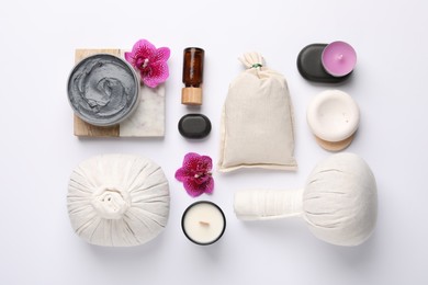 Flat lay composition with different spa products on white background