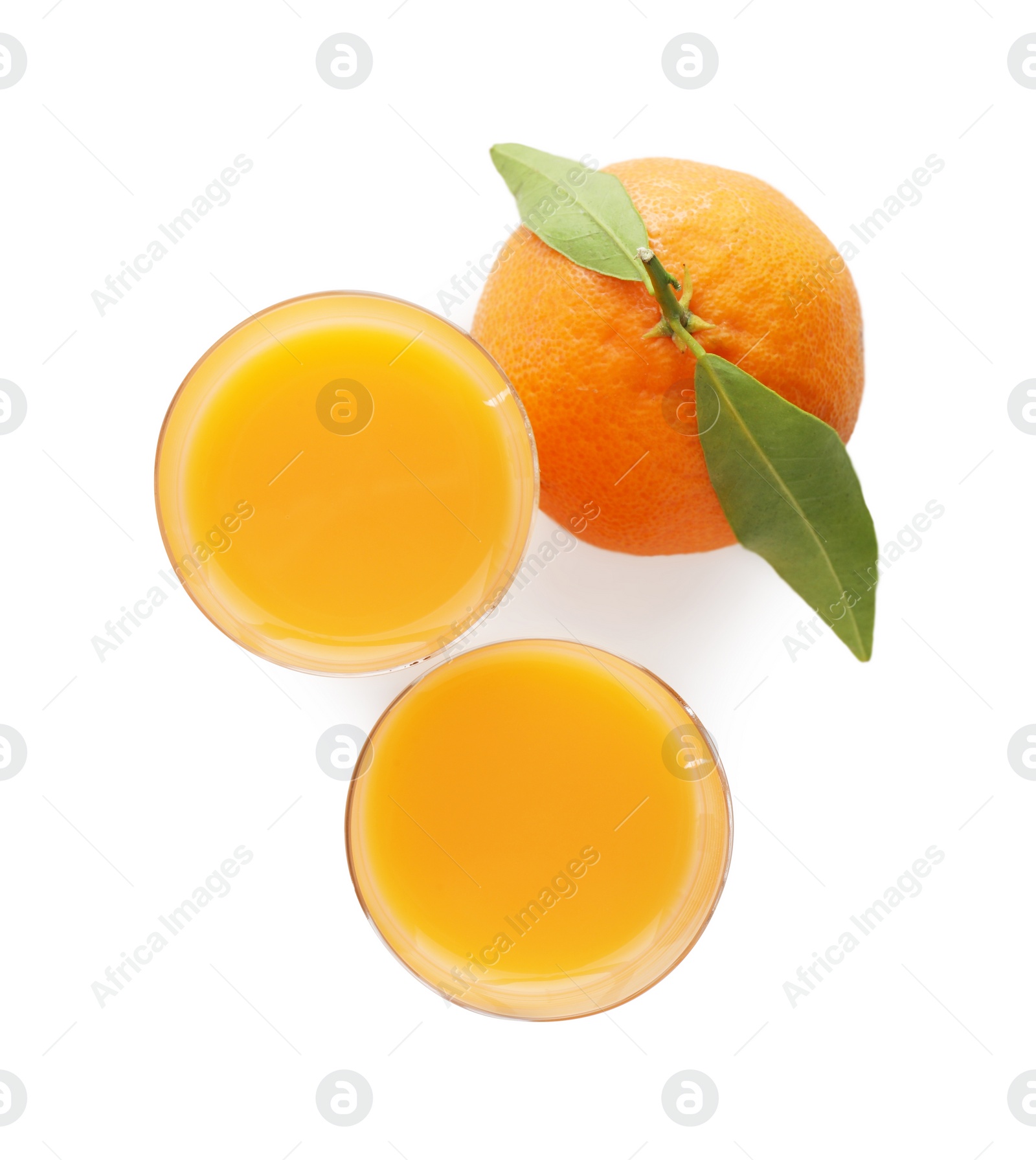 Photo of Tasty tangerine liqueur in shot glasses and fresh fruit isolated on white, top view