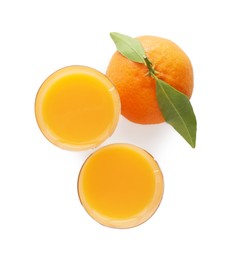 Tasty tangerine liqueur in shot glasses and fresh fruit isolated on white, top view