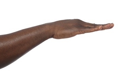 African-American man showing height on white background, closeup