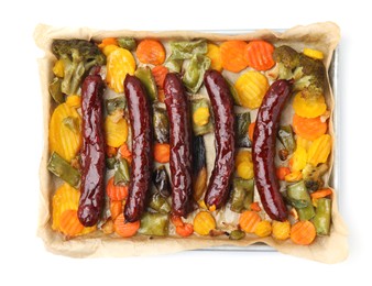 Photo of Baking tray with delicious smoked sausages and vegetables isolated on white, top view