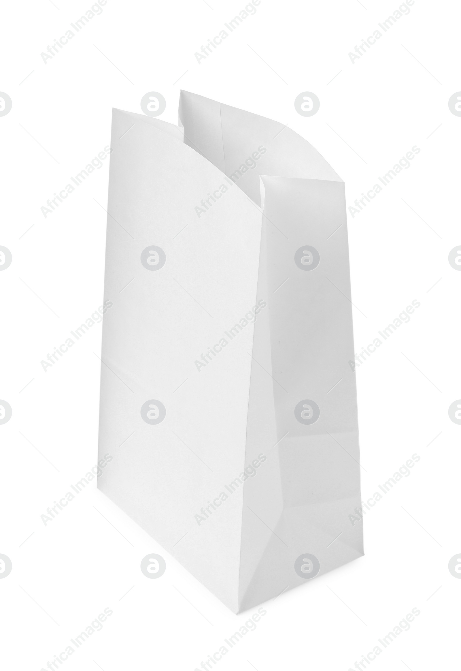 Photo of New open paper bag isolated on white