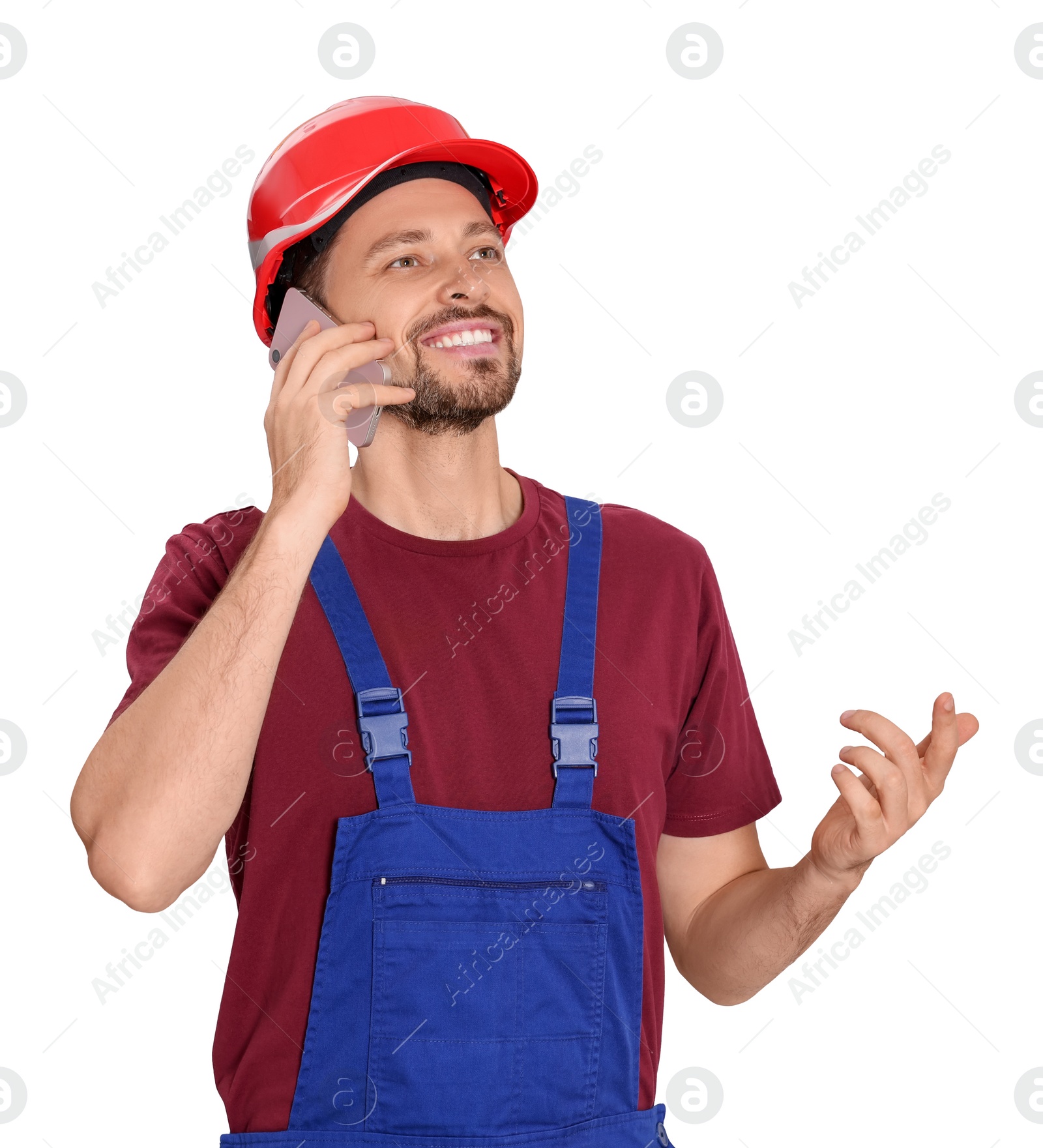 Photo of Professional repairman in uniform talking on phone against white background, space for text