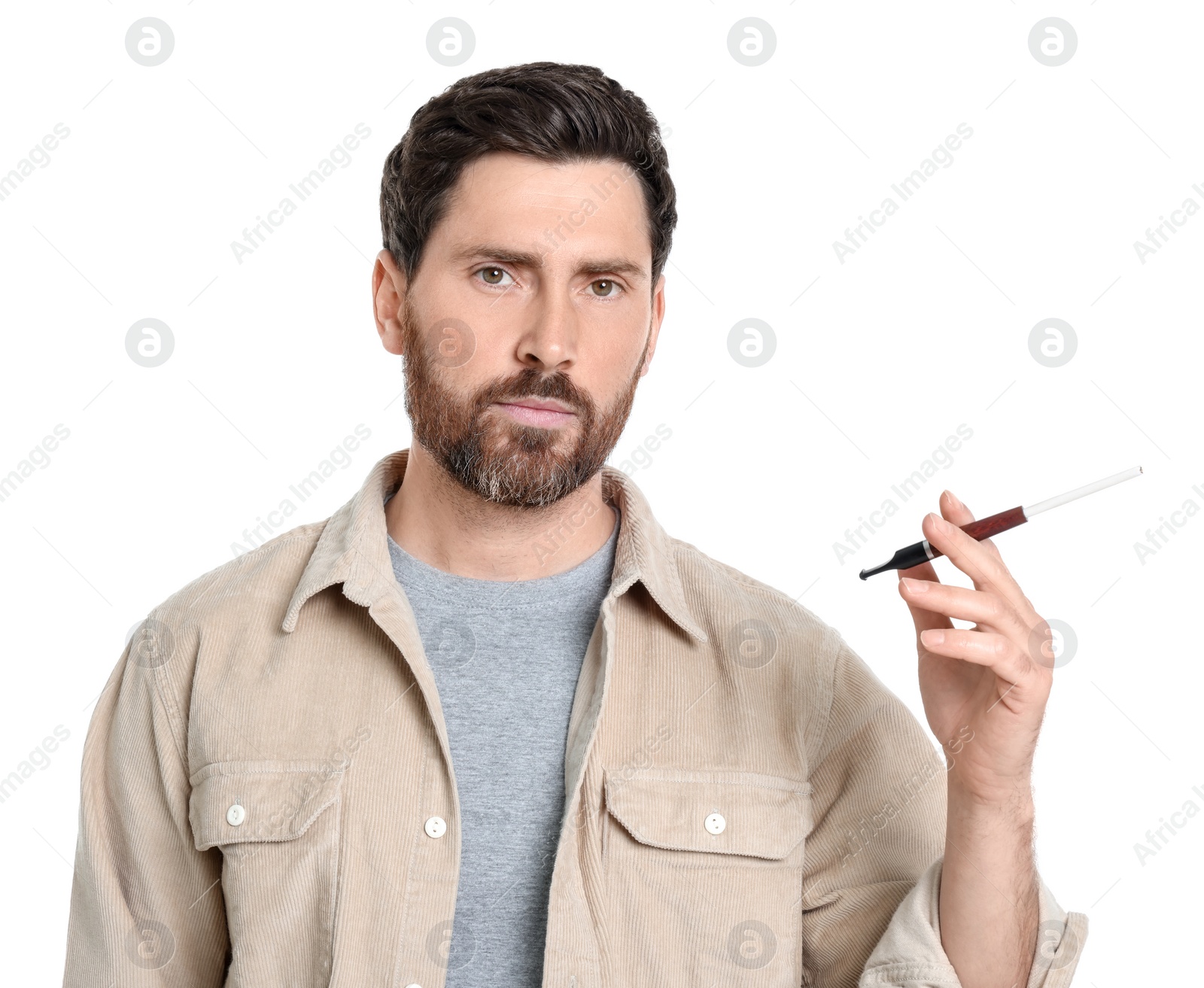 Photo of Man using cigarette holder for smoking isolated on white