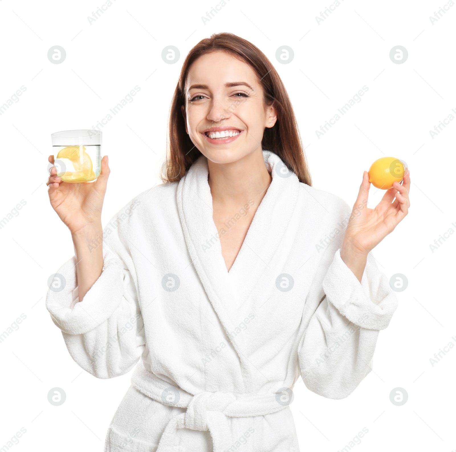 Photo of Young woman with glass of lemon water on white background