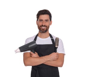 Photo of Smiling hairdresser with dryer and brush on white background