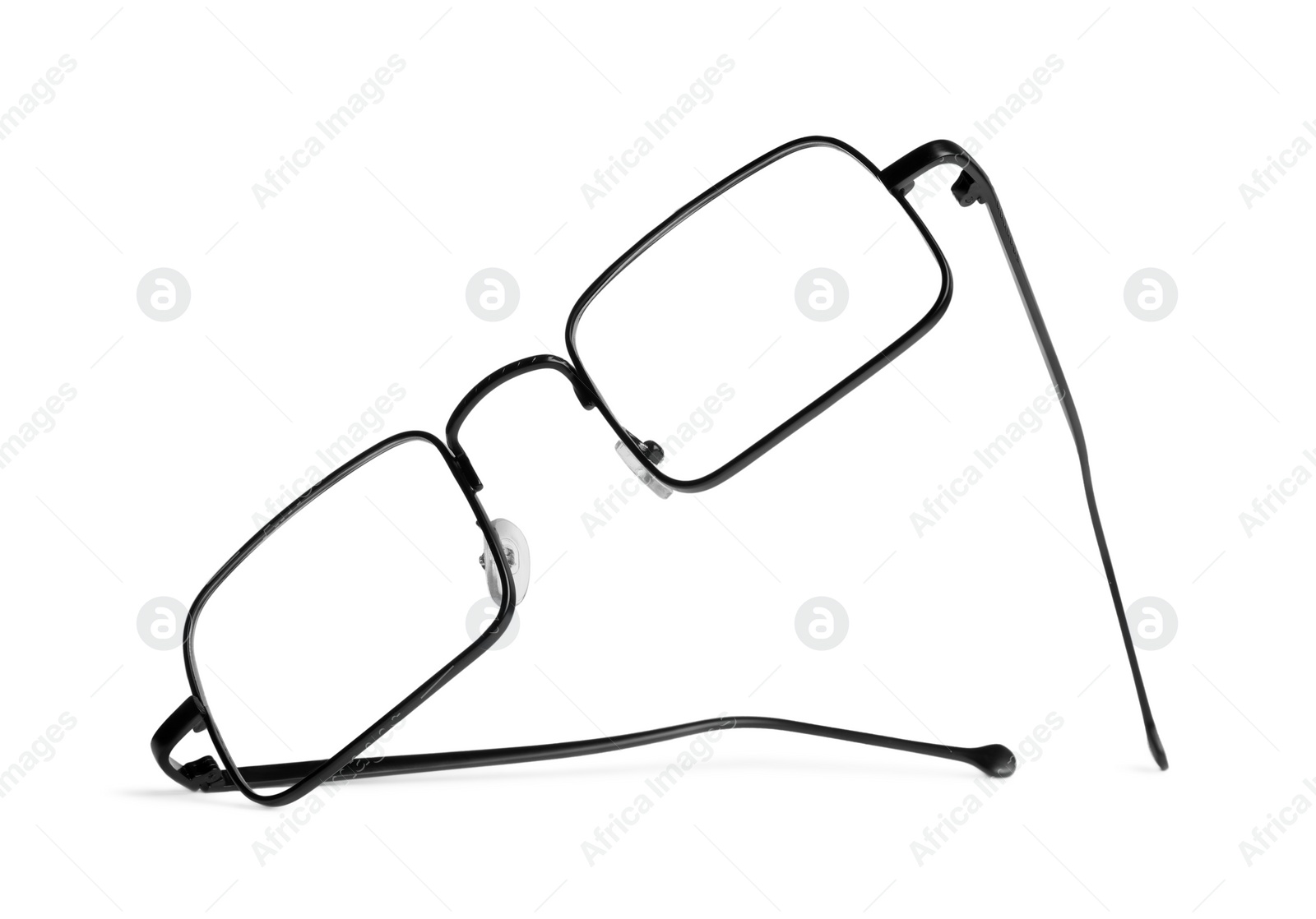 Photo of Stylish pair of glasses isolated on white