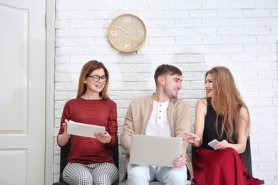 Group of people waiting for job interview, indoors