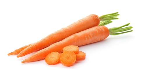 Photo of Whole and cut fresh carrots on white background