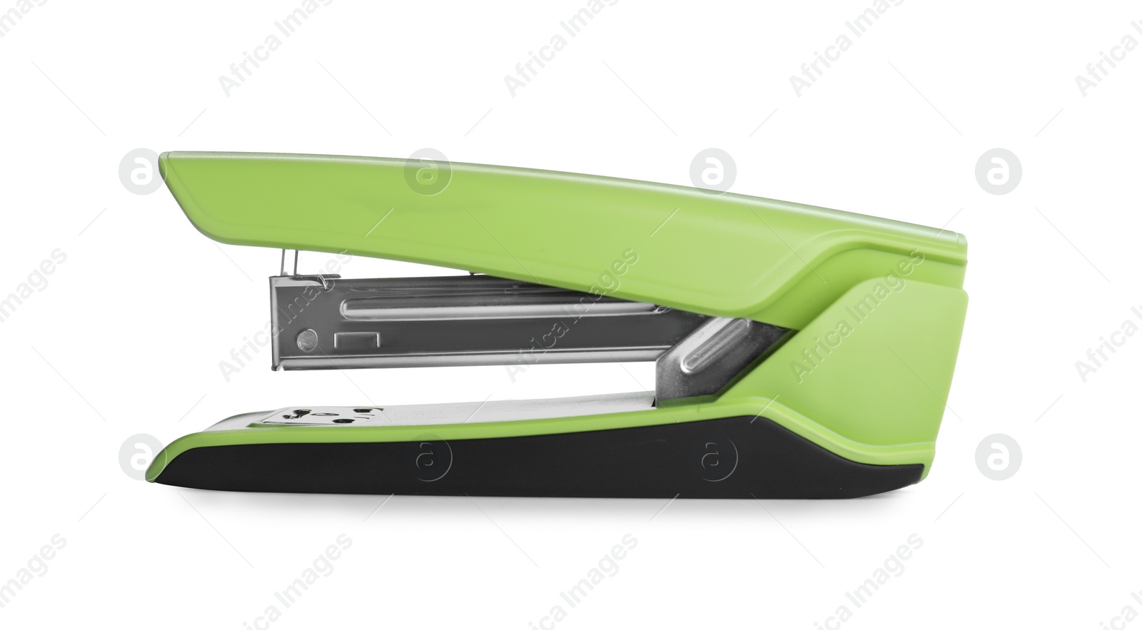 Photo of Green stapler isolated on white. Stationery for school
