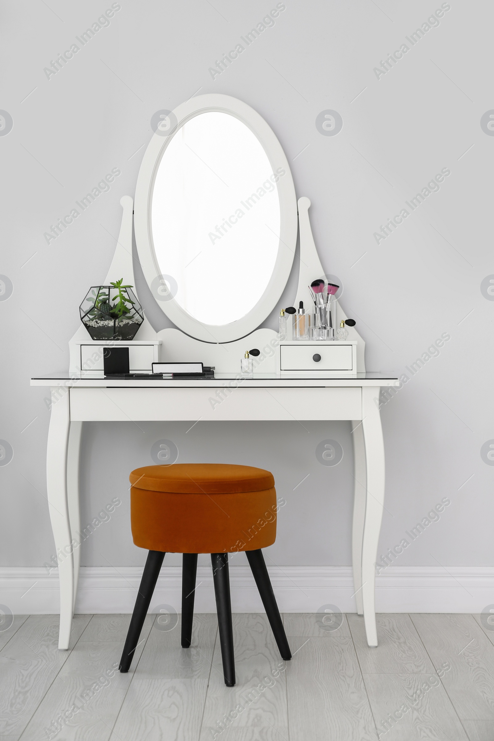 Photo of Dressing table with mirror in stylish room interior