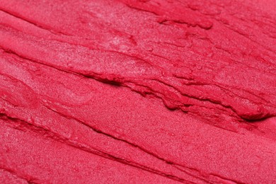 Texture of beautiful lipstick as background, closeup