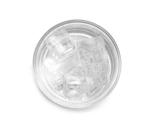 Photo of Glass of soda water with ice isolated on white, top view