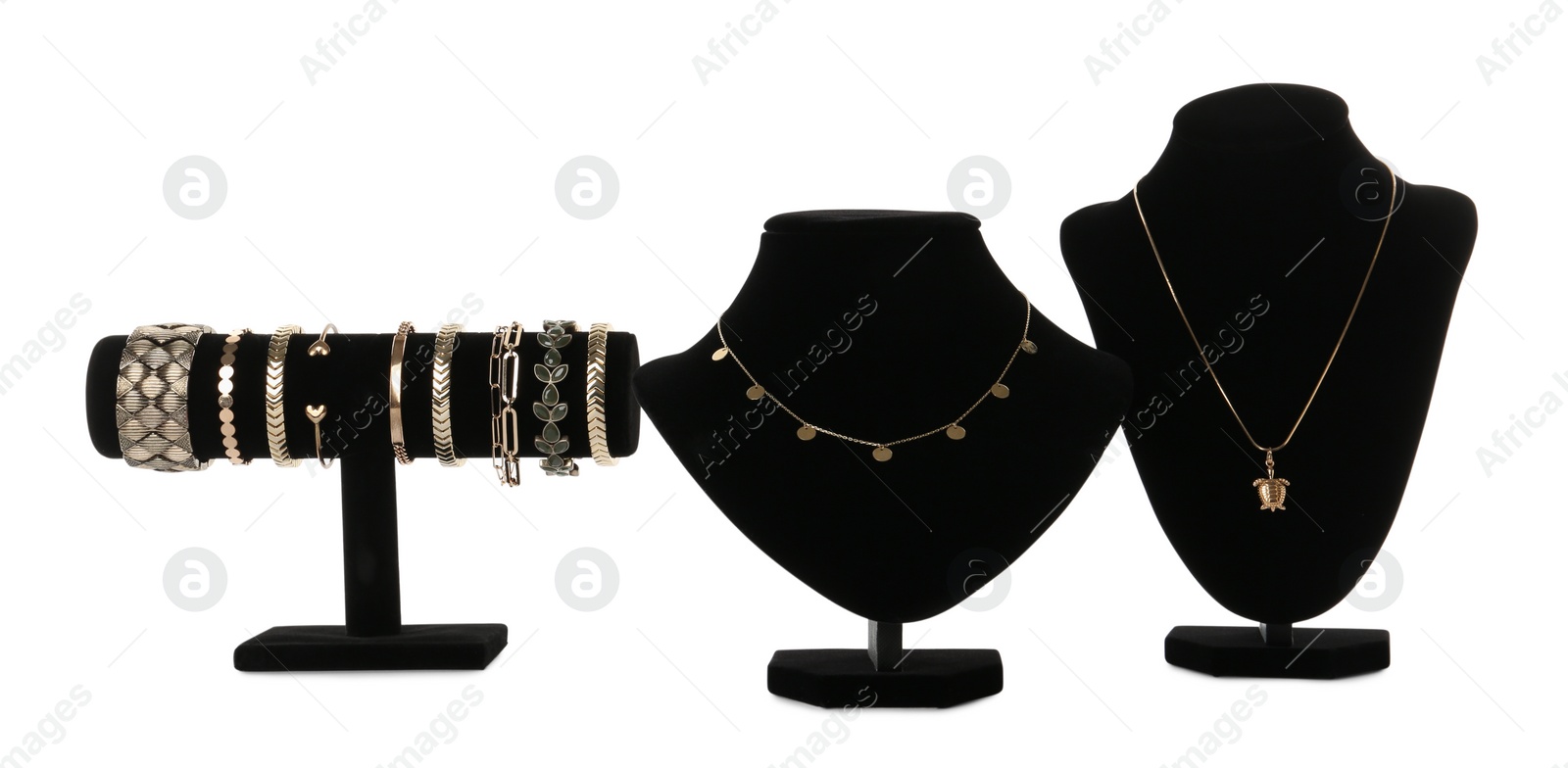 Photo of Different display stands with stylish jewelry on white background