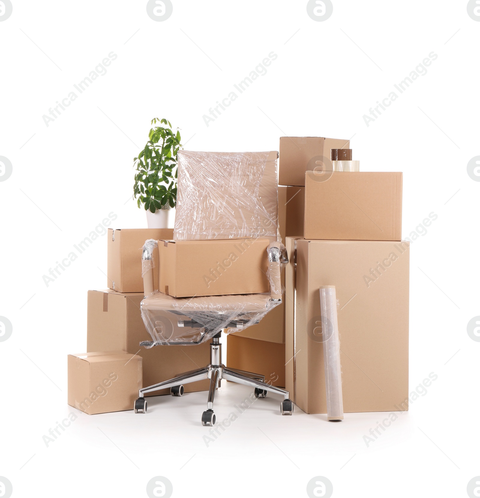 Photo of Cardboard boxes and household stuff on white background. Moving day