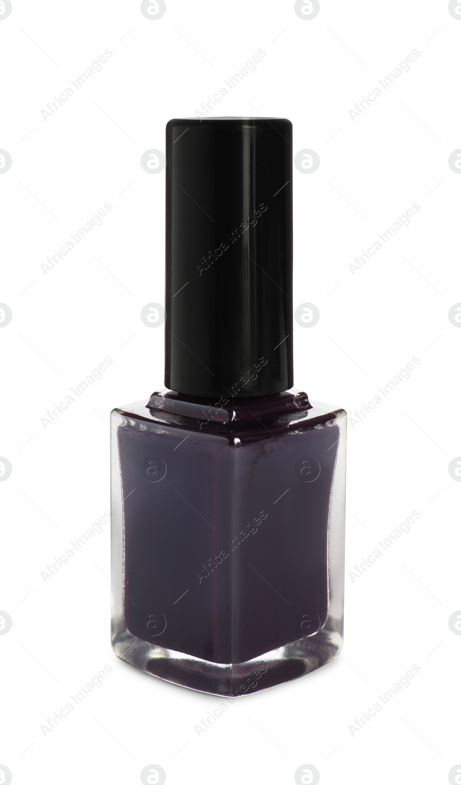 Photo of Purple nail polish in bottle isolated on white